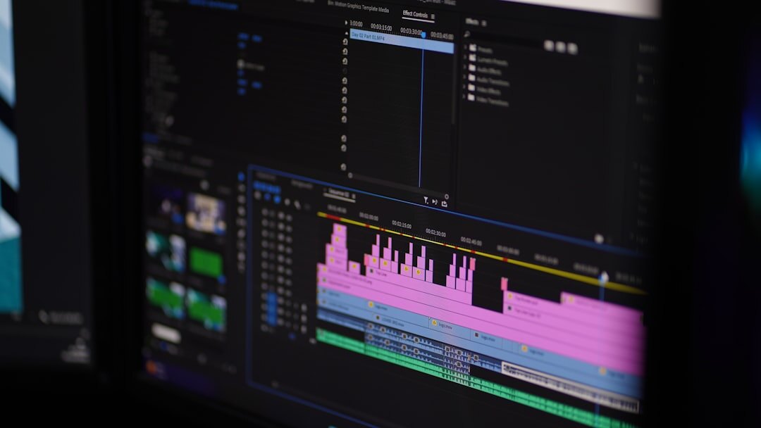 filmmaker editing video on computer