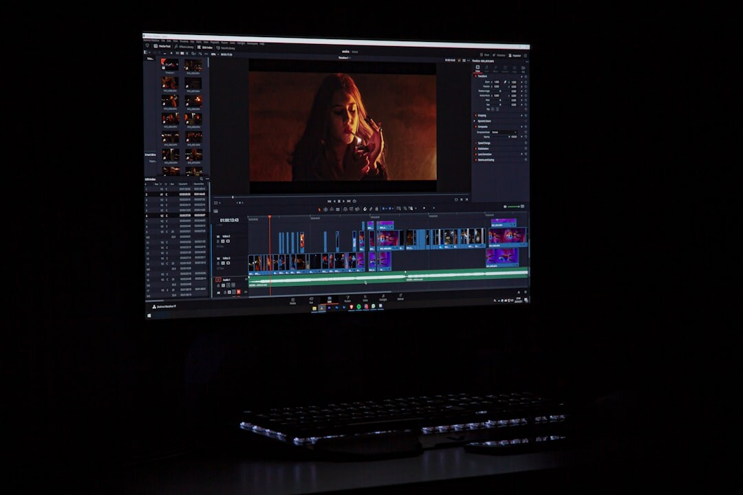 filmmaker editing video on computer